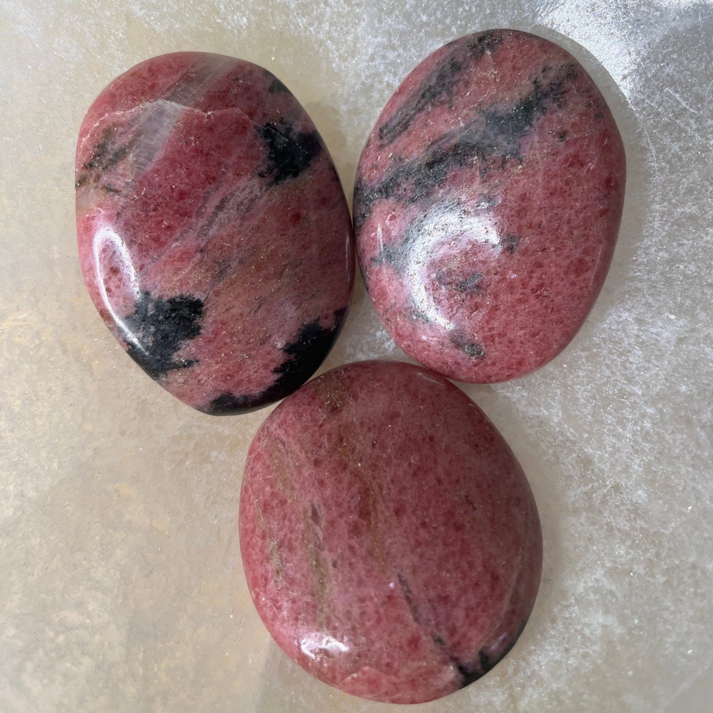 Rhodonite palm stone - A